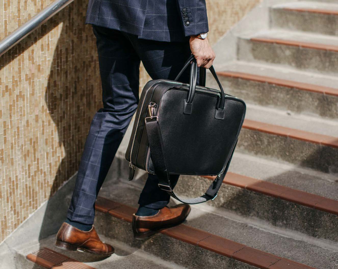 man walking up stairs